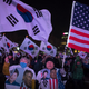 Pro-government activists take part in a rally denouncing the impeachment of Park in Seoul on January 14, 2017. Photo: ED JONES/AFP/Getty Images.
